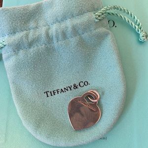 Tiffany & Co “ I love you” heart tag pendent .